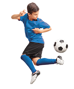 Photo of child juggling soccer ball