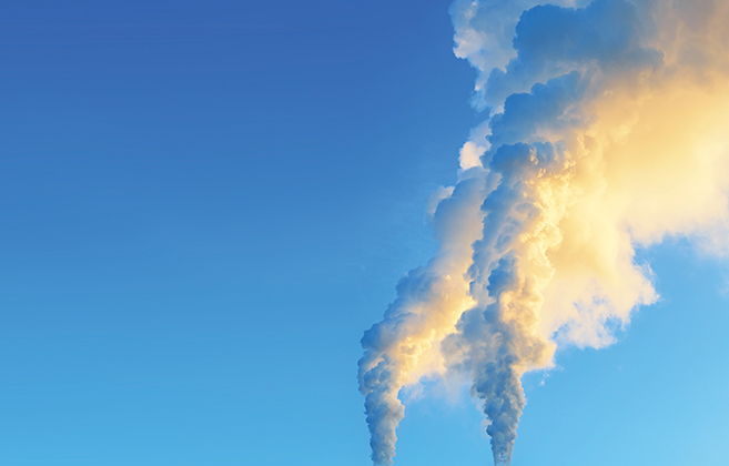 plumes of air pollution in a clear sky