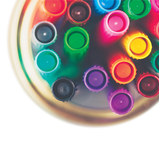 Colored markers in glass jar