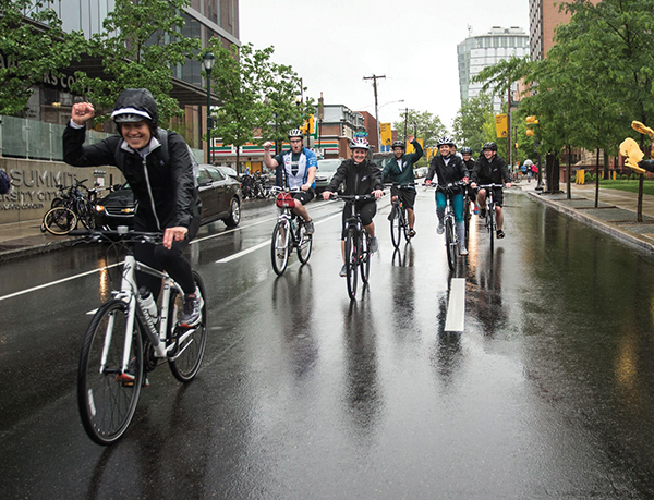 group of people riding bikes