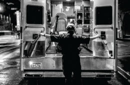 a medic opening an ambulance door