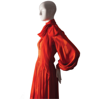 a red dress on a mannequin