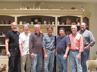 a group of friends posing that attended Drexel 50 years ago