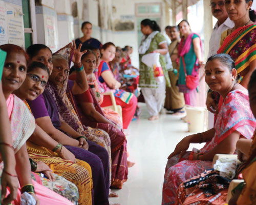 women from india sitting side by side