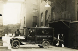 two nurses by an ambulance