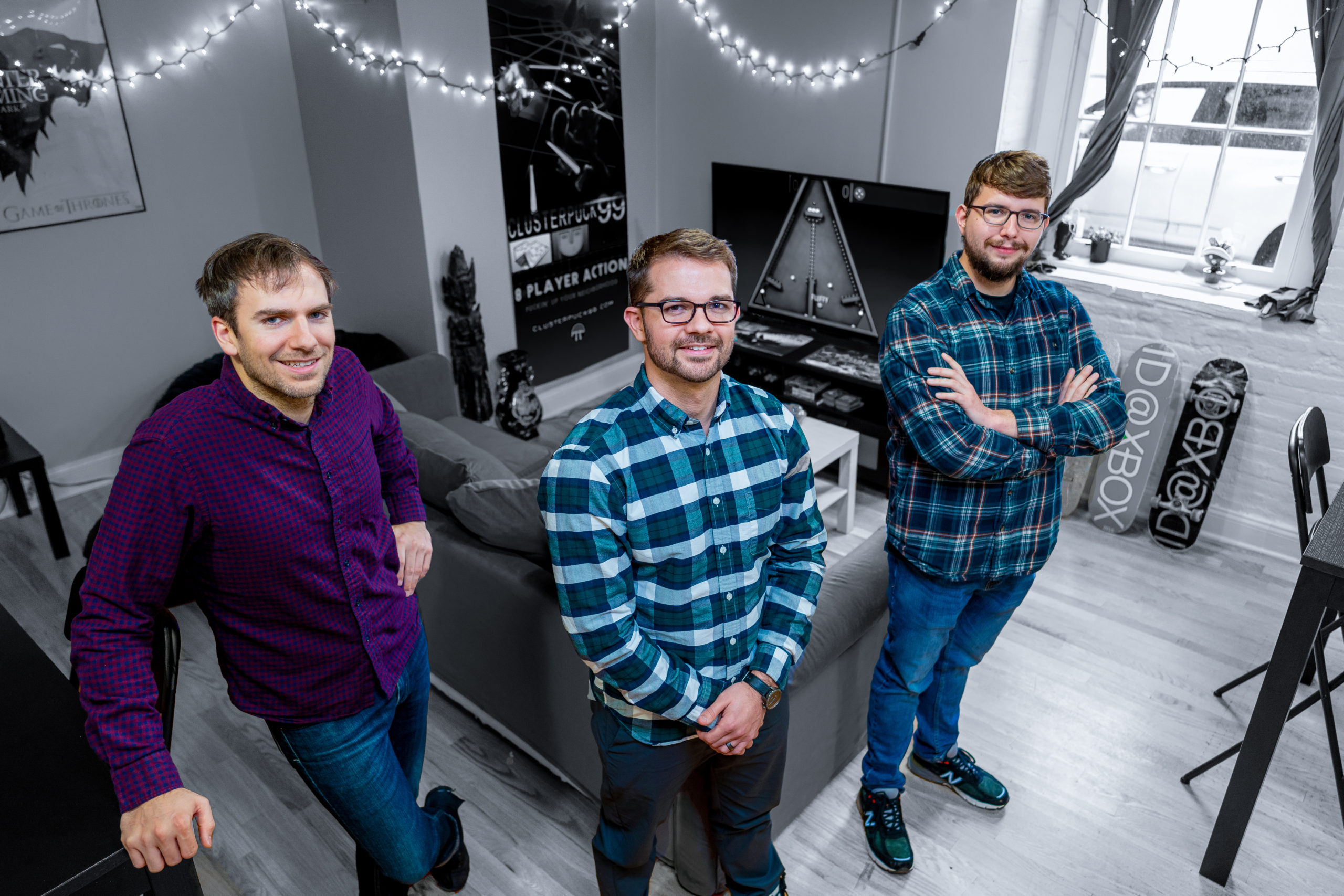 three guys standing together