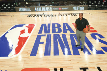 Malik Rose standing on an NBA court