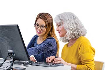 two women on a computer