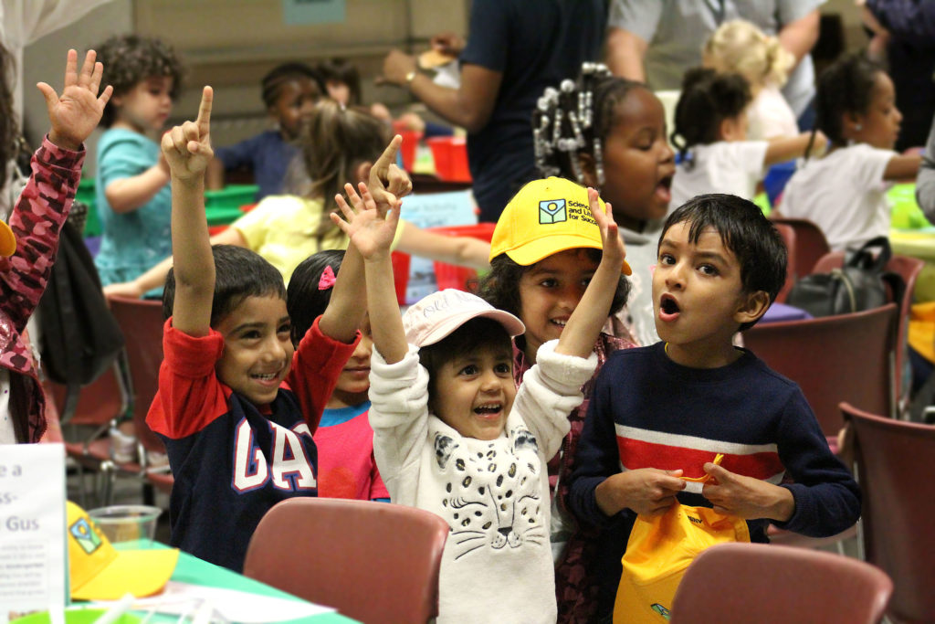 students hand up