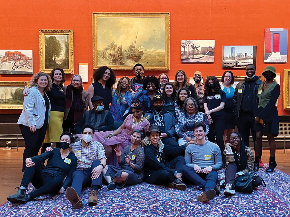 Writers Room participants in front of exhibit in Anthony J. Drexel Picture Gallery