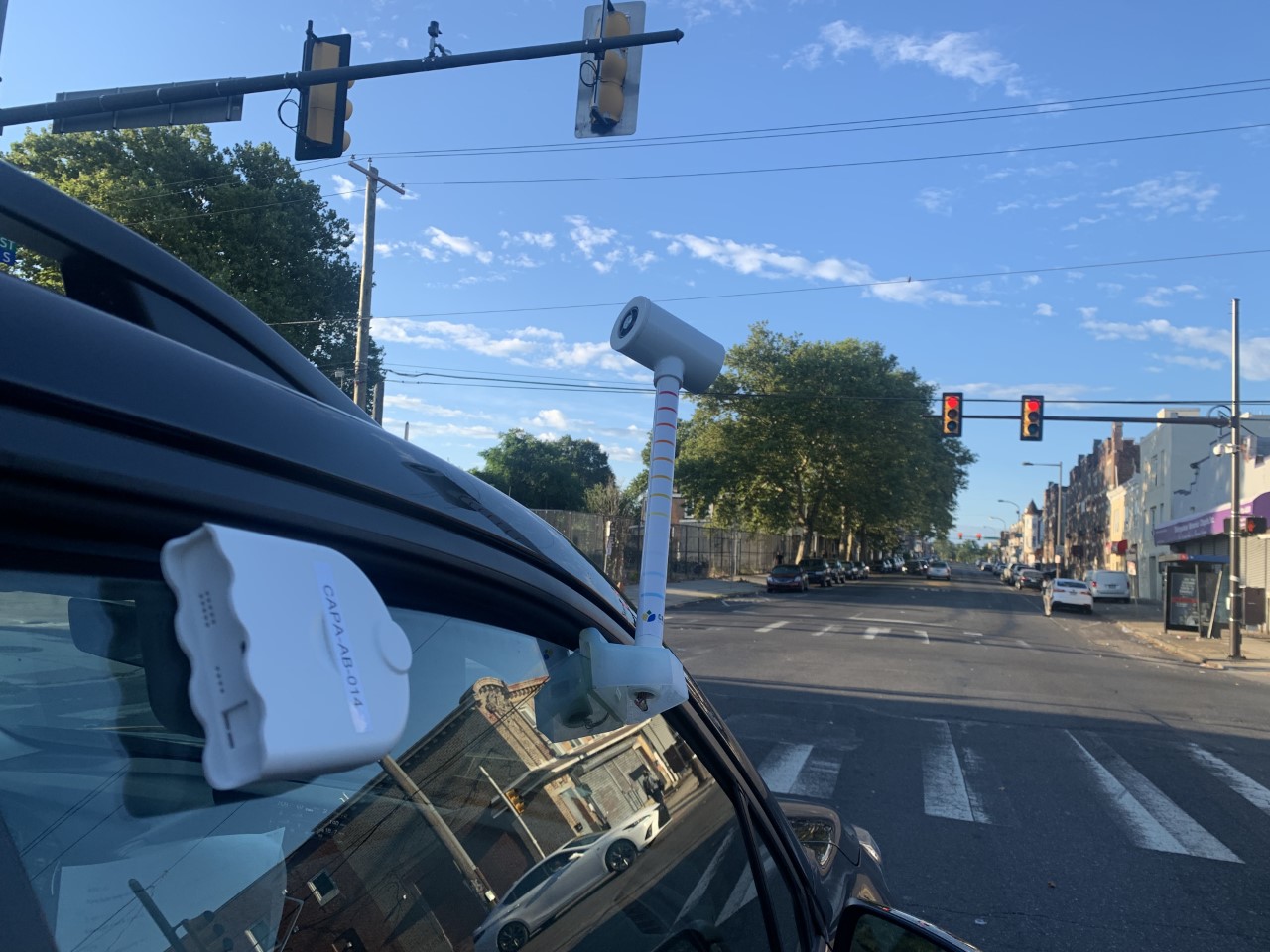 A car with heat and air quality sensors drives through West Philadelphia.